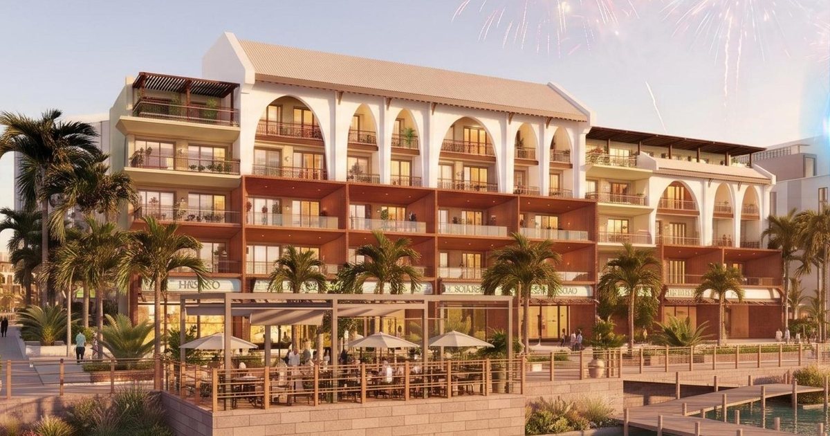 Dãy nhà thấp tầng Charmora City — shophouse mái vòm ven bến nước